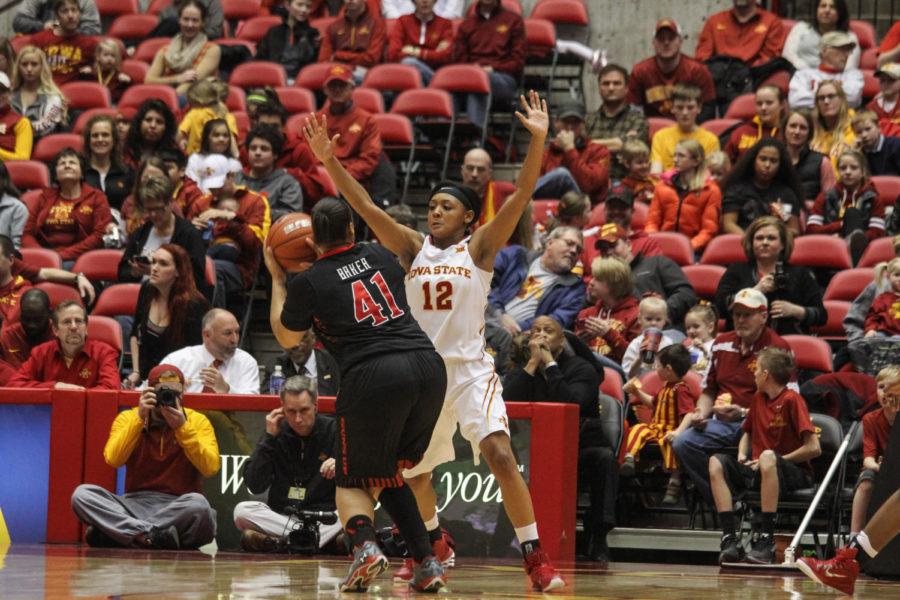 Sophomore guard Seanna Johnson guards Texas Tech's Kelsi Baker on Feb. 24, 2015. Iowa State defeated Texas Tech 59-47.