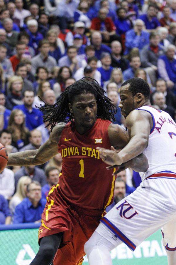 Redshirt junior forward Jameel McKay pushes his way past a KU player at Kansas on Feb. 2. The Cyclones fell to the Jayhawks 89-76. McKay had seven points for the Cyclones.