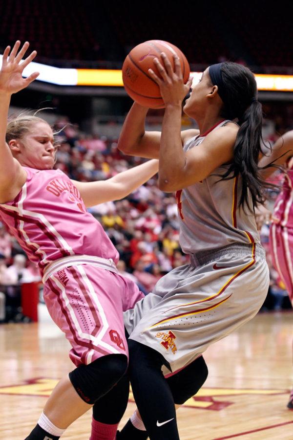 Senior guard Nikki Moody is called for a charging foul against Oklahoma on Feb. 17 at Hilton Coliseum. Iowa State won the game 84-76.