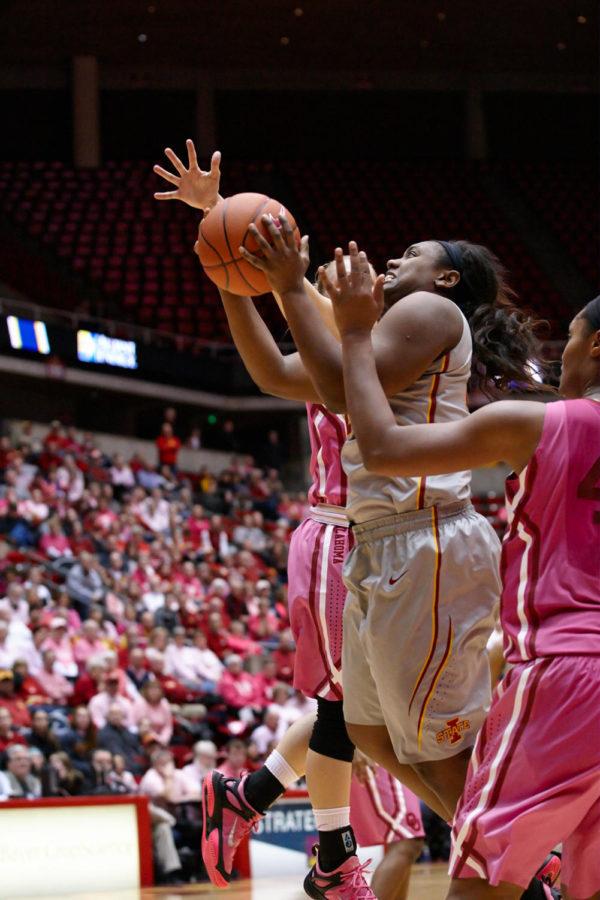 Senior guard and forward Fallon Ellis breaks through the Oklahoma defense as she drives for a layup. Iowa State won the Feb. 17 game 84-76 against Oklahoma in overtime after coming back from an early Oklahoma lead.