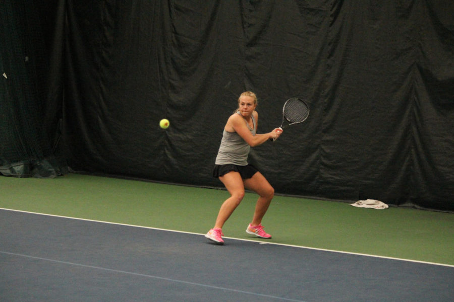 Senior Ksenia Pronina prepares to return the ball against Nebraska-Omaha on Jan. 30, 2015 at Ames Racquet and Fitness. The Cyclones swept the match 7-0.