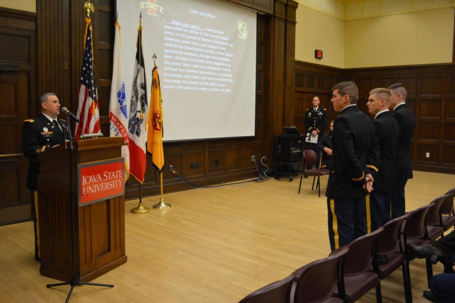 Lt. Col. Richard Smith prepares cadets to take their oath of office during the ROTC commissioning ceremony held Dec. 20 in the South Ballroom of the Memorial Union.