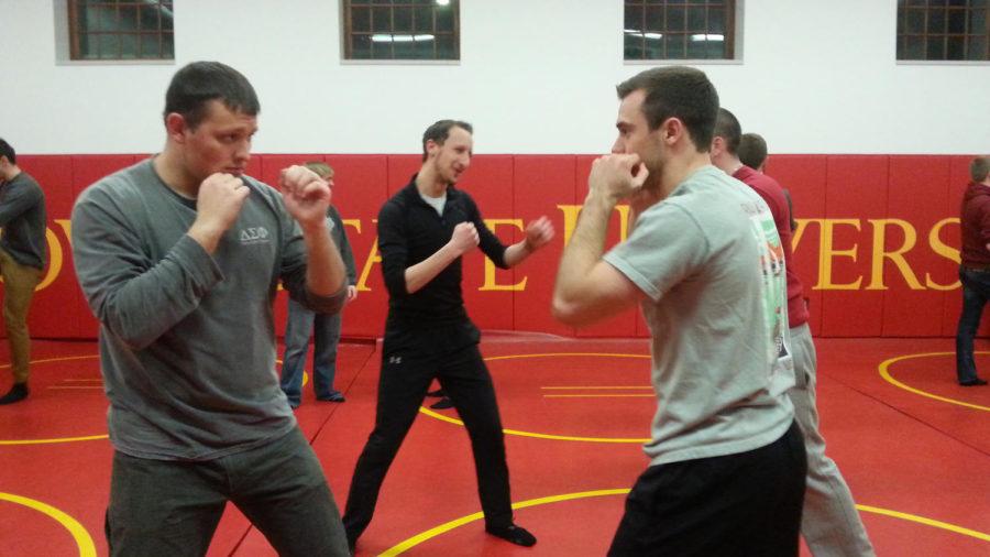 Cody Hut and Caleb Burt prepare to spar at Self Defense class. 
