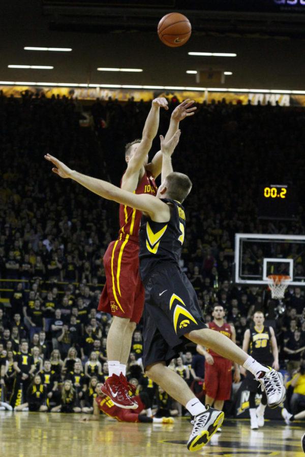 Sophomore guard Matt Thomas shoots a buzzer-beating three-pointer during the first half against Iowa on Dec. 12 at Carver-Hawkeye Arena. The Cyclones beat the Hawkeyes 90-75.