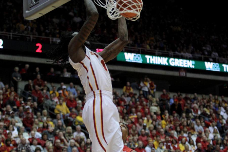 Redshirt junior forward Jameel McKay dunks during the ISU mens basketball game against Texas Tech on Feb. 7, 2015. The Cyclones defeated the Red Raiders 75-38.