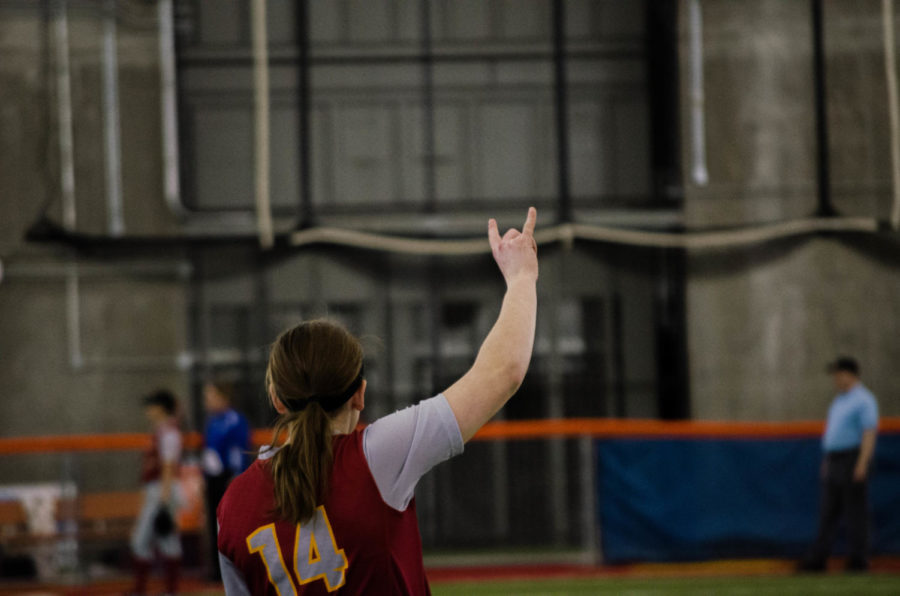 Kelsey McFarland signals the team. Communication was key in the ISU hometeam victory last weekend. The Cyclones won 6-0 in its second invitational game Feb. 2.