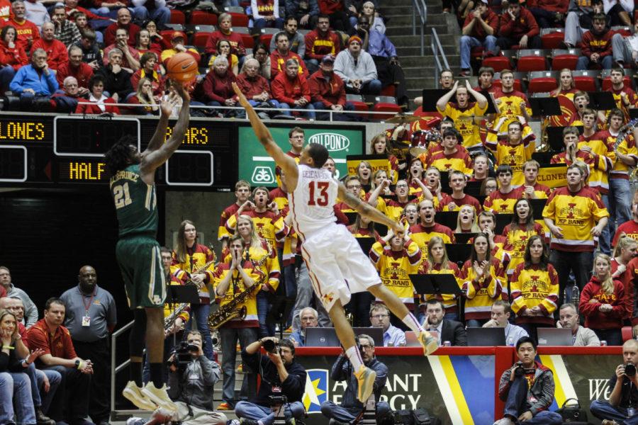 Baylors Taurean Prince shoots a 3-pointer while Iowa States senior guard Bryce Dejean-Jones attempts to block the shot on Feb. 25. The No. 12 Cyclones fell to the No. 19 Bears, ending a 21-game home winning streak.