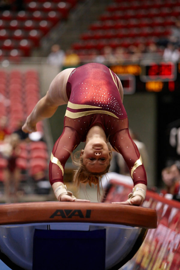 Freshman Haylee Young inverts herself on the vault during the met against Oklahoma on Feb. 6.