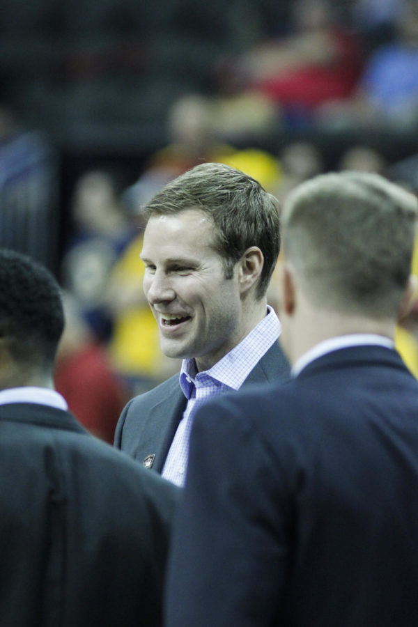 ISU coach Fred Hoiberg talks with assistant coaches before the game against Texas in the Big 12 Championship quarterfinal on March 12 at the Sprint Center in Kansas City, Mo. After trailing the entire game, the Cyclones made the comeback to win 69-67.