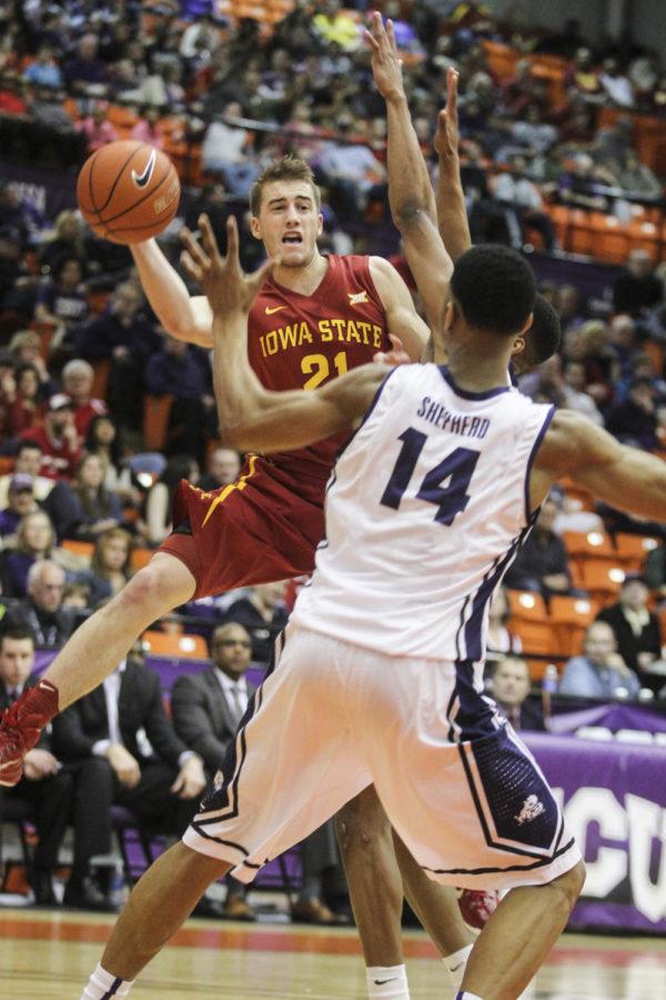 Sophomore guard Matt Thomas passes to a teammate during the game against Texas Christian on March 7 at Wilkerson-Greines Athletic Center in Fort Worth, Texas. The Cyclones defeated the Horned Frogs 89-76.