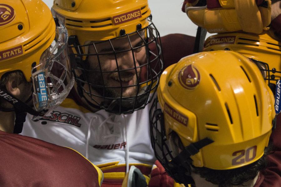 Cyclone+Hockey+team+members+embrace+after+scoring+a+goal+during+the+match+against+Midland+University+on+Feb.+28%2C+which+resulted+in+a+13-0+win+for+the+Cyclones.