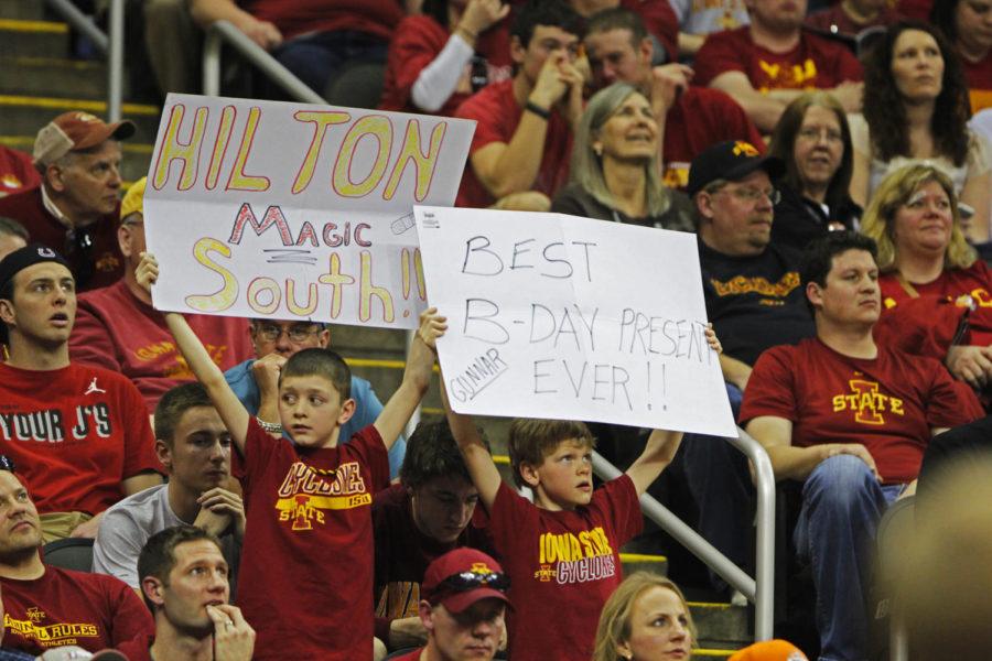 Fans hold up signs calling the Sprint Center Hilton South during the Phillips 66 Big 12 Championship game against Baylor in Kansas City, Mo., on March 15. The Cyclones defeated the Bears 74-65 in their first final-round appearance since 2000.
