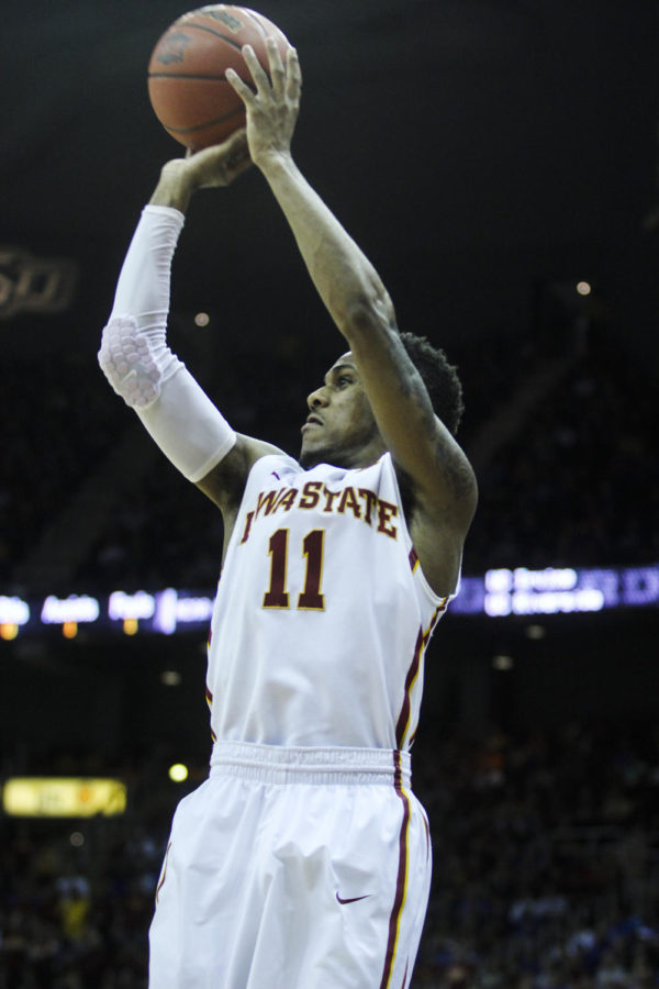 Sophomore guard Monté Morris puts up a 3-pointer against Texas in the Big 12 Championship quarterfinal game on March 12 at the Sprint Center in Kansas City, Mo. After trailing the entire game, the Cyclones came back to win 69-67. Morris had a career-high of 24 points and scored the game-winning, buzzer-beater shot.
