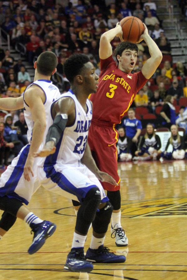 Freshman guard Clayton Custer looks for an open teammate during Iowa States matchup against the Drake Bulldogs. Custer scored six points and had three assists, helping Iowa State defeat the Bulldogs 83-54 during the Hy-Vee Big Four Classic on Dec. 20.
