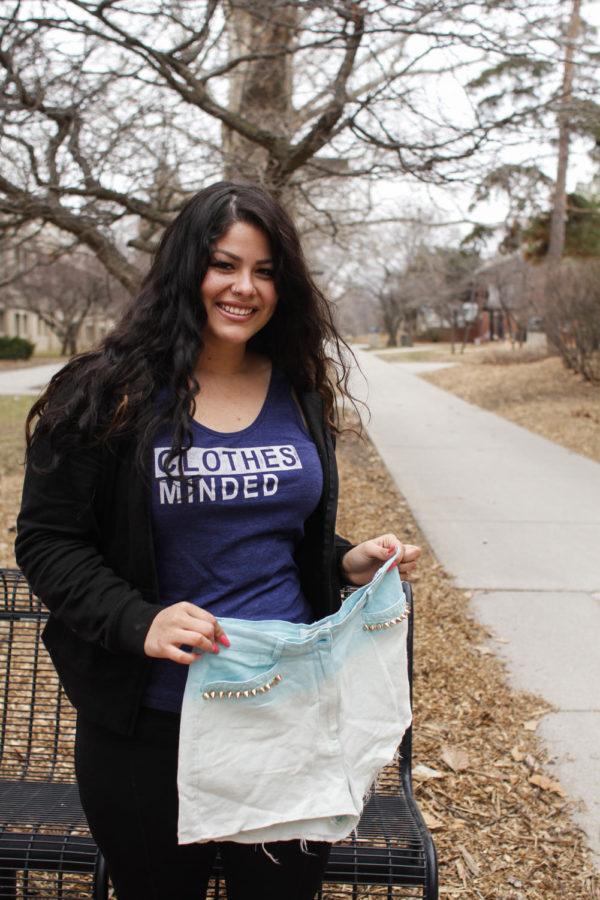Andrea Tate, senior in apparel design, created her own business up-cycling clothes. Tate takes garments like jeans and turns them into fashionable and one-of-a-kind shorts. She also screenprints on old T-shirts.