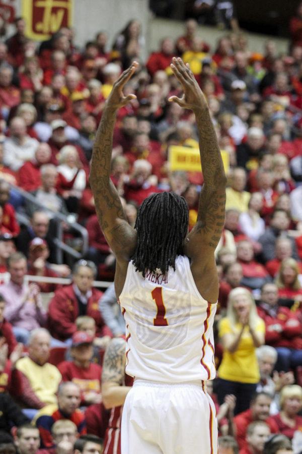 Redshirt junior Jameel McKay raises his arms to pump up the crowd during the game against No. 15 Oklahoma at Hilton Coliseum on March 2. The No. 17 Cyclones defeated the Sooners 77-70 after a rocky 18-point first half.