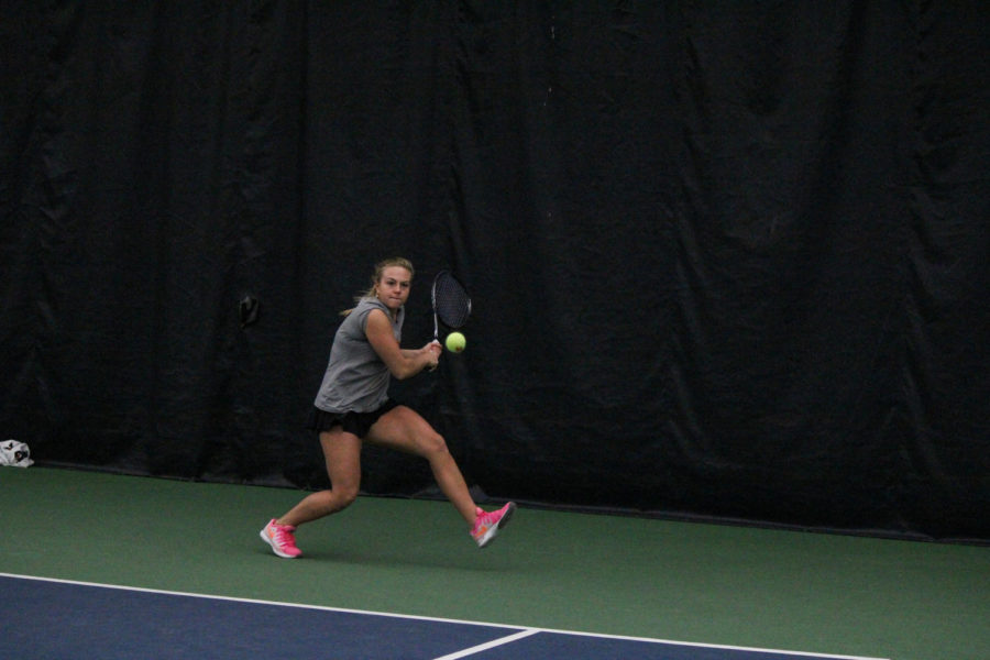 Senior Ksenia Pronina returns the ball during her singles match up against Oklahoma on Feb. 22. The Cyclones lost 4-2.