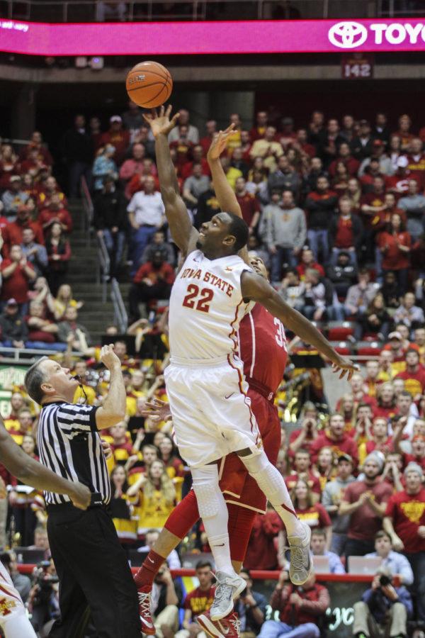 Senior forward Dustin Hogue jumps up for tip-off during the game against No. 15 Oklahoma at Hilton Coliseum on March 2. The No. 17 Cyclones defeated the Sooners 77-70 after a rocky 18-point first half. Hogue had 7 points for Iowa State.