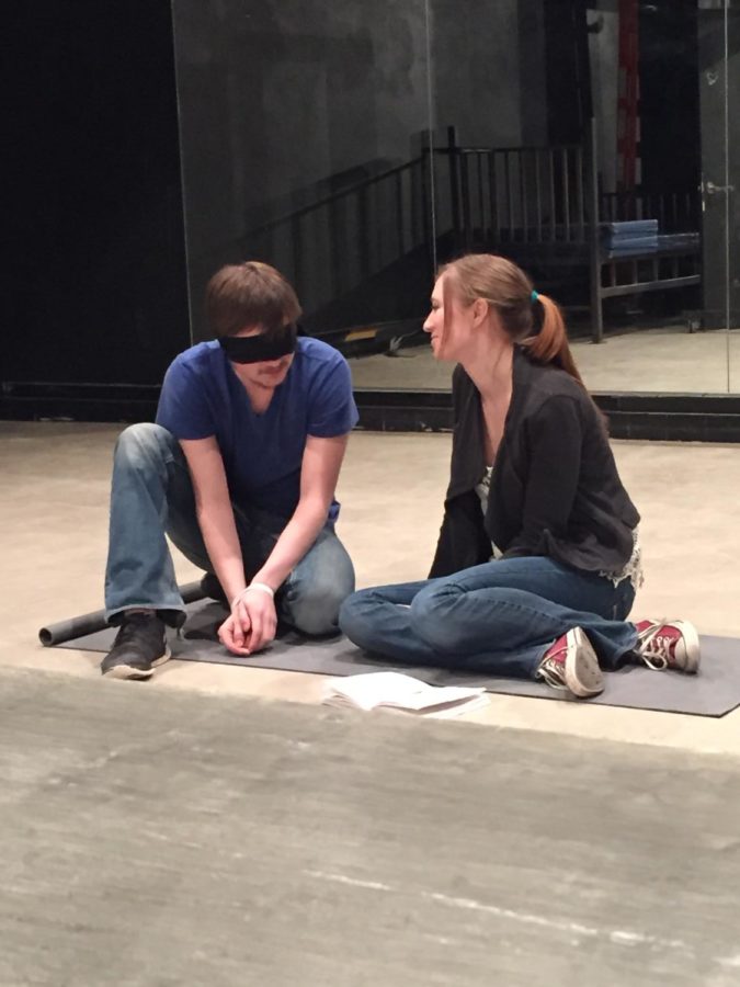 Michael and Lainie talk to each other during the Two Rooms play.