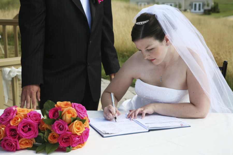 Bride+signing+marriage+certificate