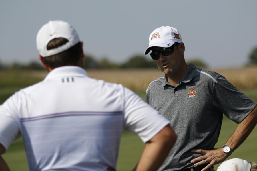 ISU mens golf coach Andrew Tank is seen speaking with senior Sam Daley in October, 2014. Tank will return to his alma mater, Minnesota, at the 2015 Gopher Invitiational on Sept. 13 and 14.