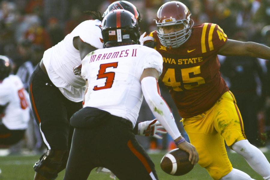 Then-senior defensive end Dale Pierson goes after then-Texas Tech quarterback Patrick Mahomes on Nov. 22, 2014, at Jack Trice Stadium. Pierson and fellow defensive lineman Trent Taylor worked on leading other junior college transfers in their first season. 