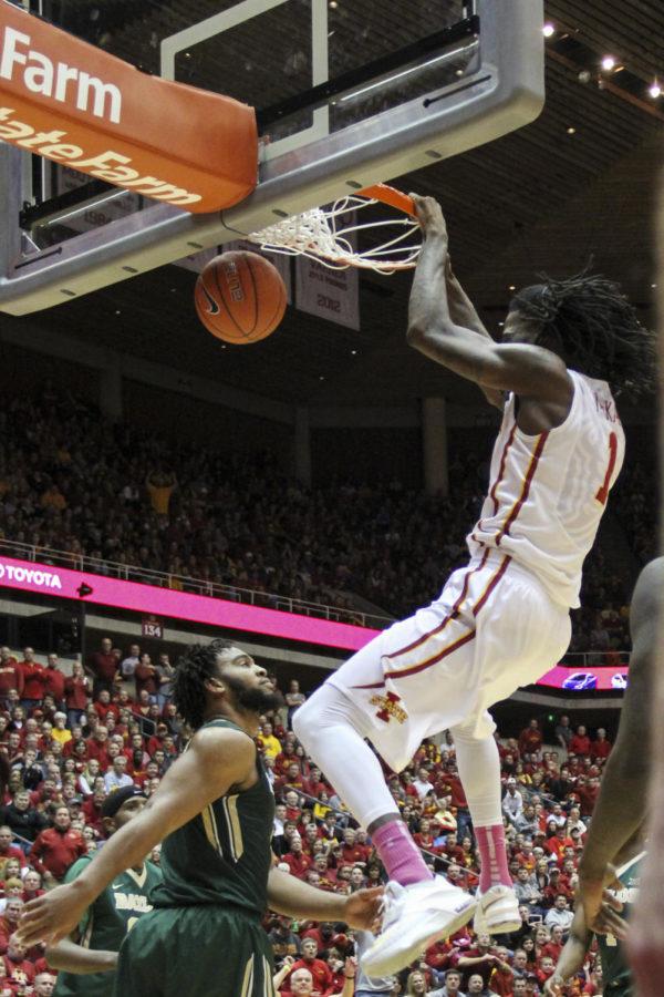 Redshirt junior forward Jameel McKay dunks the ball during the first half against No. 19 Baylor. The No. 12 Cyclones fell to the Bears 79-70. McKay led Iowa State with 21 points and eight rebounds.