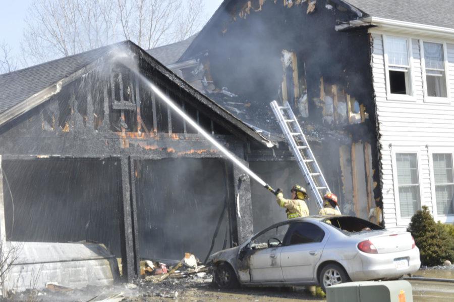 Ames firefighters combatting a garage fire that broke out at 2932 Somerset Dr. in Ames on Thursday afternoon. Firefighters were called to the scene about 1 p.m. and had the blaze under control about an hour later. No one was injured.