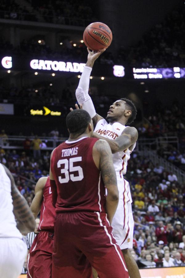 Sophomore guard Monte Morris puts up a shot during the Big 12 Championship semifinal game against Oklahoma on March 13 at the Sprint Center in Kansas City, Mo. The Cyclones defeated the Sooners 67-65 to advance to the final championship game against Kansas on March 14. Morris had 11 points for Iowa State.