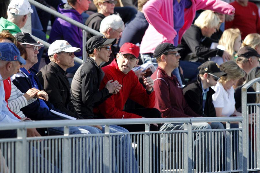 ISU Athletic Director Jamie Pollard sits with his wife, Ellen Pollard, at the Drake Relays on Thursday in Des Moines. Pollards son, Thomas, finished first in the boys 3200 meter run with a time of 9:07.50.