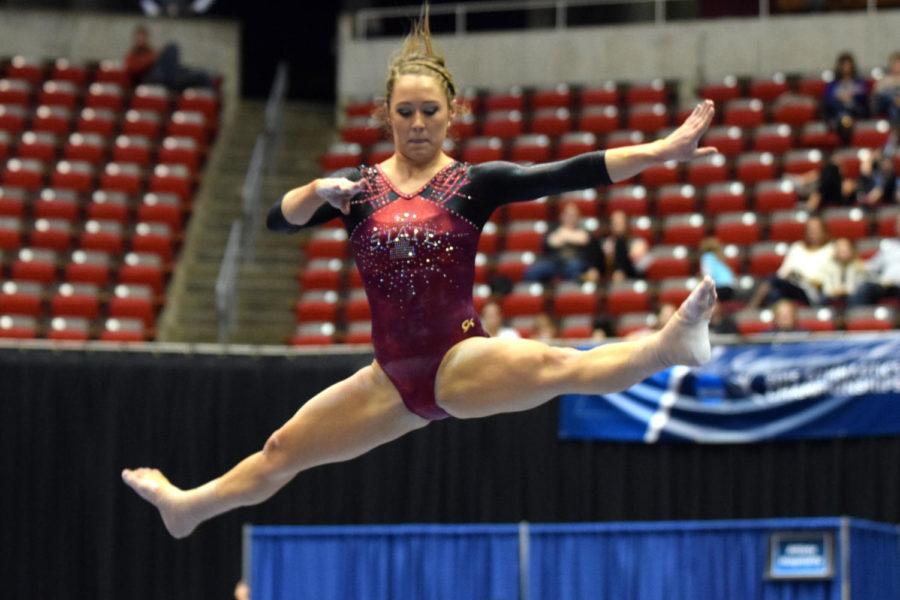 Junior Sammie Pearsall competes on the beam during the NCAA Regionals on Saturday at Hilton Coliseum.
