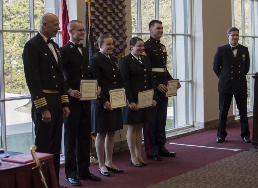 Members of the ROTC Cyclone Battalion receive awards during the 2015 Navy ROTC Awards Ceremony on April 11 in the Campanile Room of the Memorial Union.