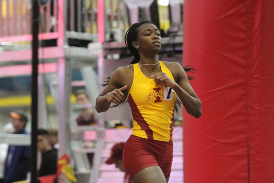 Kendra White, a junior from St. Louis, Mo., races Feb. 1 at the Bill Bergan Invitational at Lied Recreation facility. White took third in the Womens 400-meter dash with a time of 54.11.