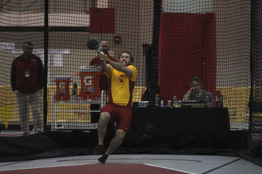 Senior Henry Kelley competes in the mens weight throw during the Big 12 Indoor Championship at Lied Recreation Athletic Center on Feb. 27, 2015