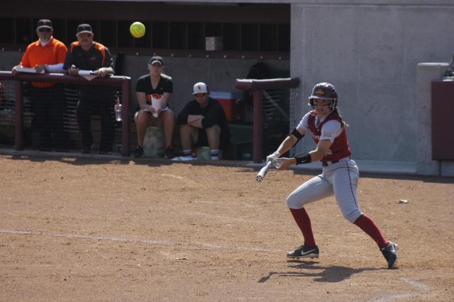 Cathlin Bingham hits the ball during Iowa States second game of a doubleheader against Oklahoma State on Saturday. The Cyclones won the game 8-7.