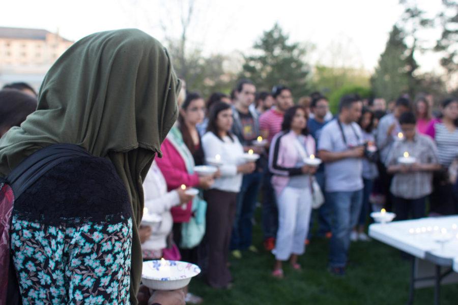 About 100 people from the ISU and Ames community gathered Thursday, April 30, on Central Campus to remember the almost 6,000 who died in the 7.8 magnitude earthquake in Nepal with a candle light vigil. The earthquake occurred Saturday, April 25, but aftershocks continue to shake the country. The Nepal Student Association hosted the event. About two-thirds in attendance were from Nepal.