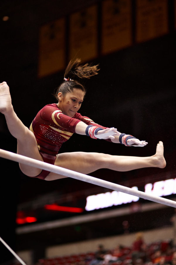 Freshman Briana Ledesma lets the bar fall out of her grip while competing on the uneven bars against Oklahoma on Feb. 8.