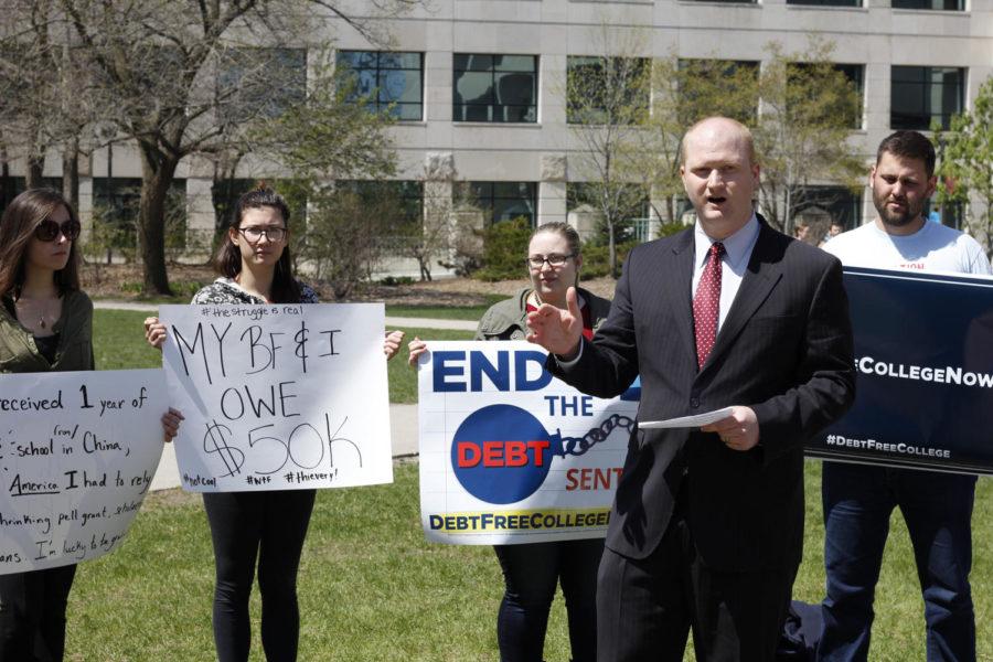 Jim Mowrer speaks to students about ending student debt in the Free Speech Zone by Parks Library on Thursday, April 23.
