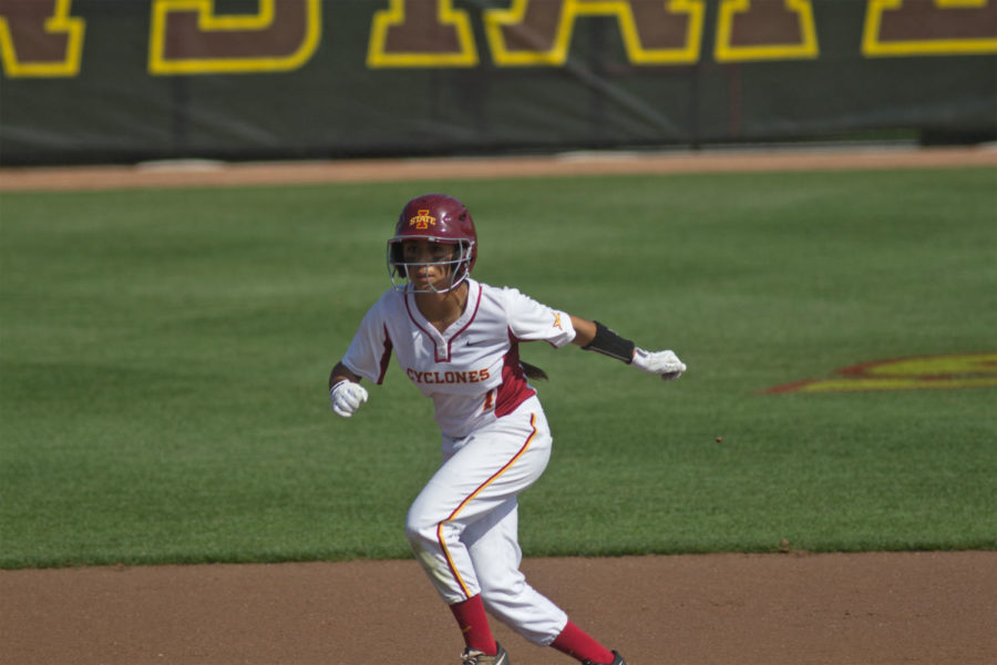 Junior center fielder Brittany Gomez takes off running during Iowa State's 11-4 loss against Kansas on Friday.