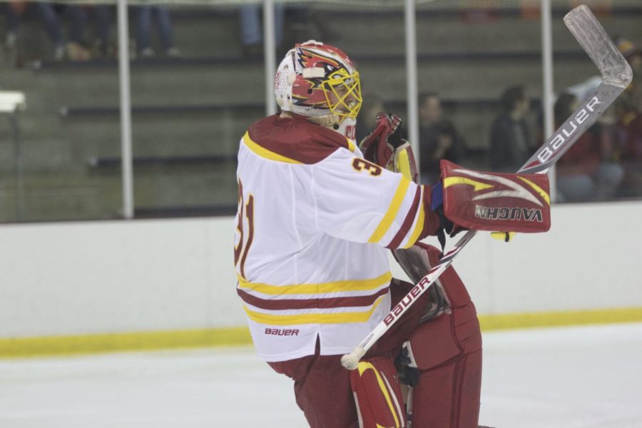 Senior goalie Matt Cooper fist pumps and celebrates after his team scores a goal against Colorado State on Nov. 22. ISU defeated Colorado State with a final score of 5-2. 