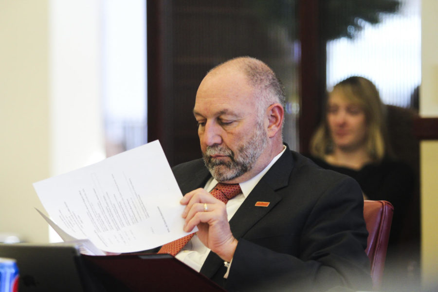 ISU president Steven Leath listens during the Iowa Board of Regents meeting on Dec. 3, 2014 at the Alumni Center.