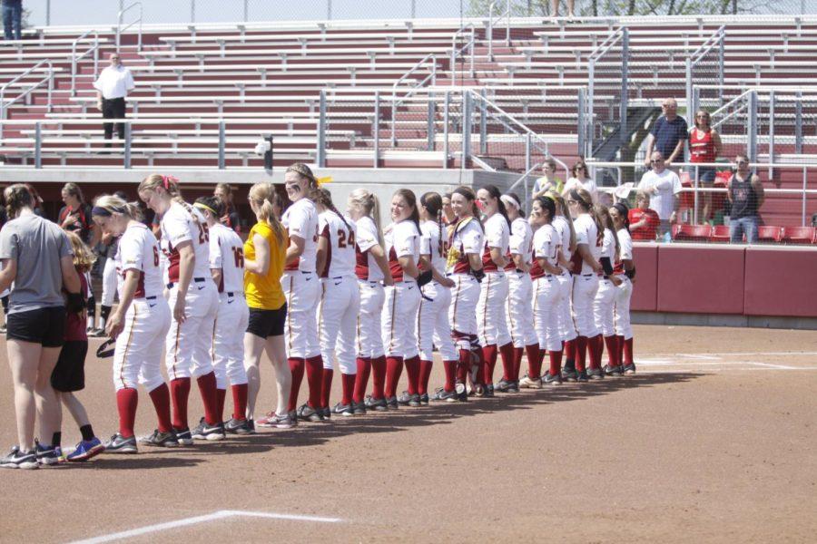 The ISU softball team lines up after introductions and awaits the national anthem. The team lost 6-5 against Texas Tech on May 3. 