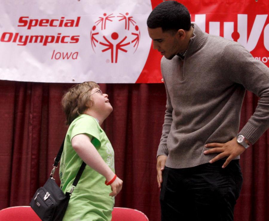 Naz Long talks to one of the athleets at the end of the Special Olympics summer games opening ceremonies.