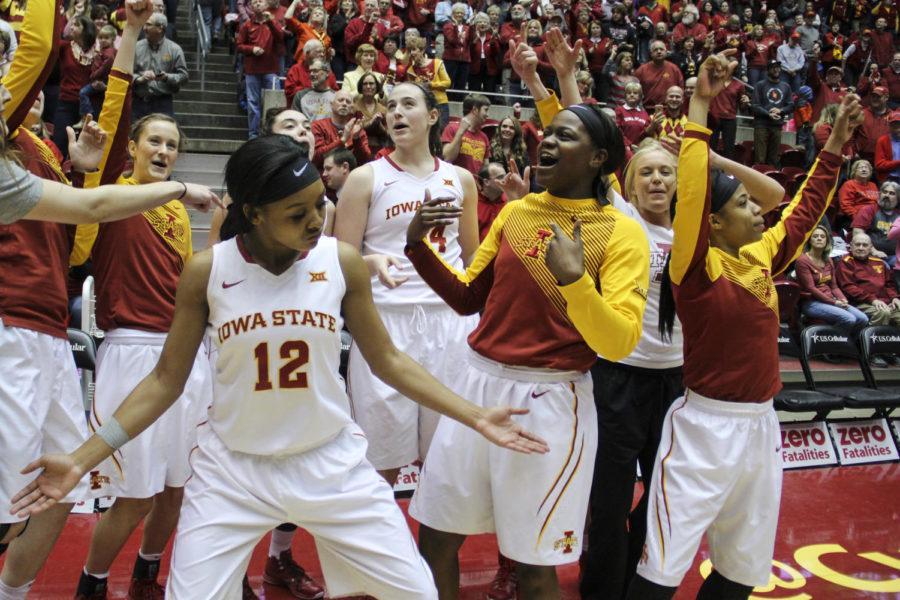 The ISU womens basketball team celebrates its win against No. 3 Baylor on Feb. 28. The Cyclones took down the Bears 76-71 on Senior Night. The game was ISU coach Bill Fennellys 600th win at Iowa State.