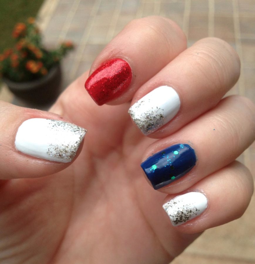 Trying+out+fun+nail+designs+for+the+Fourth+of+July+is+a+popular+way+to+add+interest+to+a+festive+outfit.+Try+painting+nails+red%2C+white+and+blue+while+adding+a+touch+of+sparkle.