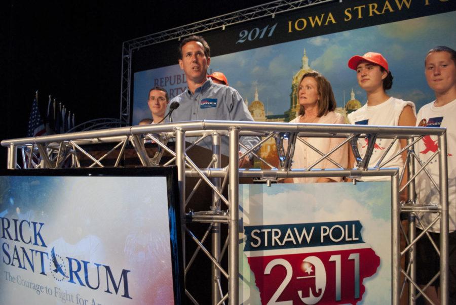 Rick Santorum, a GOP presidential candidate, stands on stage with his wife to give his final Iowa Straw Poll speech in 2011 at Hilton Coliseum. Republican officials in Iowa voted today to cancel the 2015 event, which was scheduled to be held in Boone on Aug. 8.