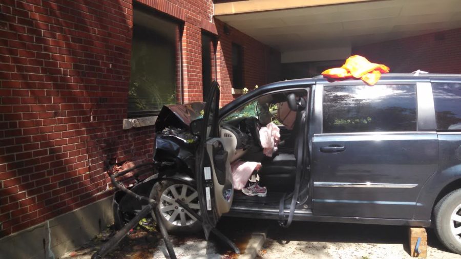 A woman and child crashed into the General Services Building after losing control of the vehicle on Saturday, July 18.