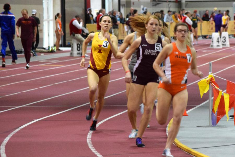 Sophomore Evelyn Guay rounds a corner in the 800-meter run at the Iowa State Classic on Feb. 14, 2015. 