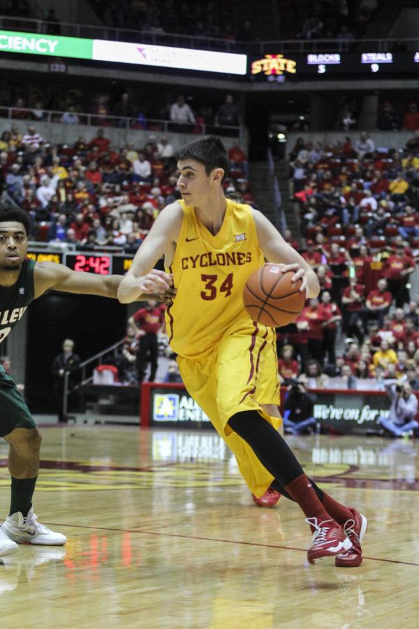 Forward/center Georgios Tsalmpouris makes his way to the basket during Iowa States game against Mississippi Valley State on Dec. 31, 2014. The 83-33 win was Fred Hoibergs 100th win as coach of the Cyclones.