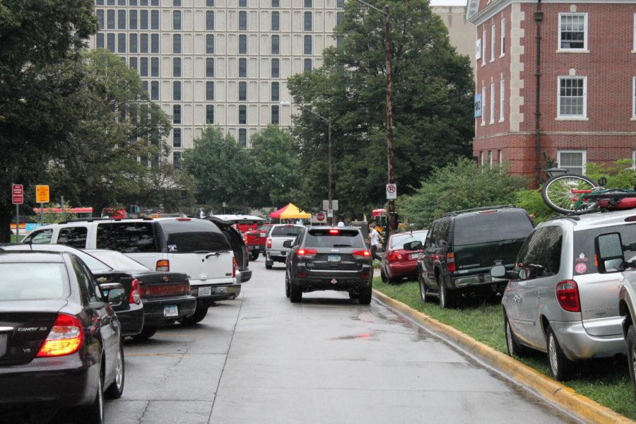 The families of new freshmen park wherever they can find a spot while moving in their children into the dorms on Aug. 18.
